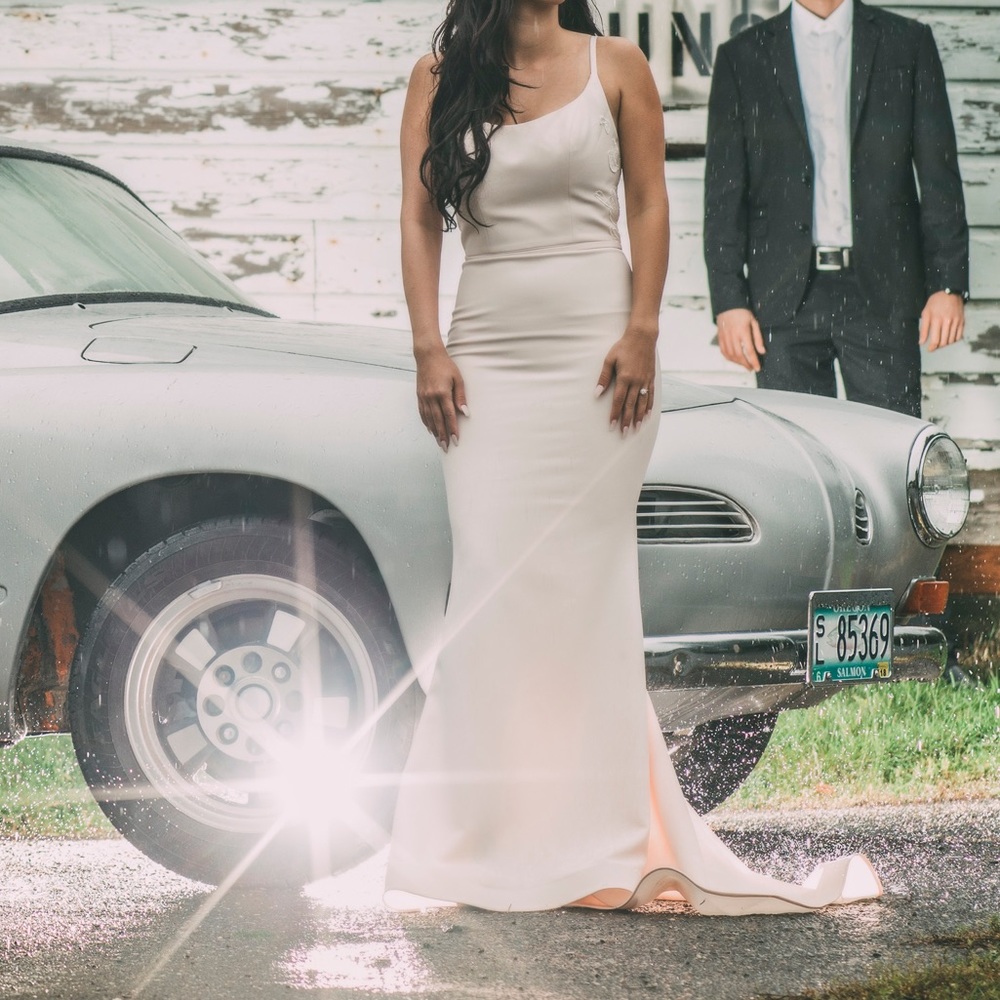 White backless gown without the detachable bow